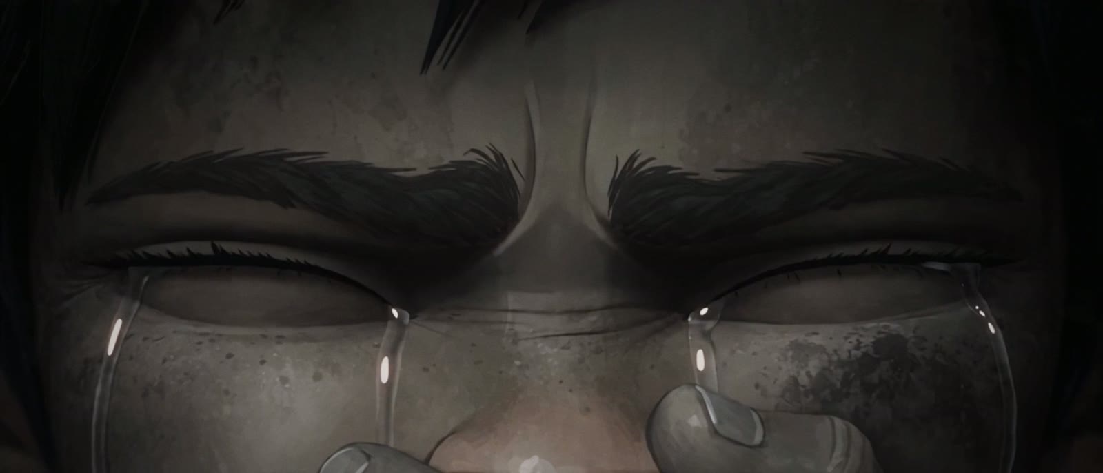 A boy's eyes, wet with tears.